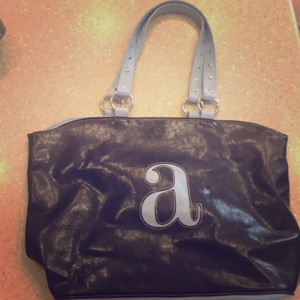 Baby blue and black “a” tote purse